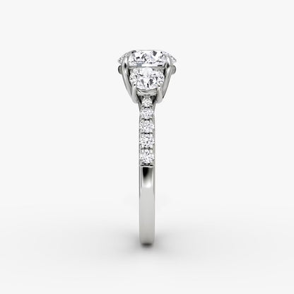 The Erelis Three Stone Round Brilliant Pave Engagement Ring