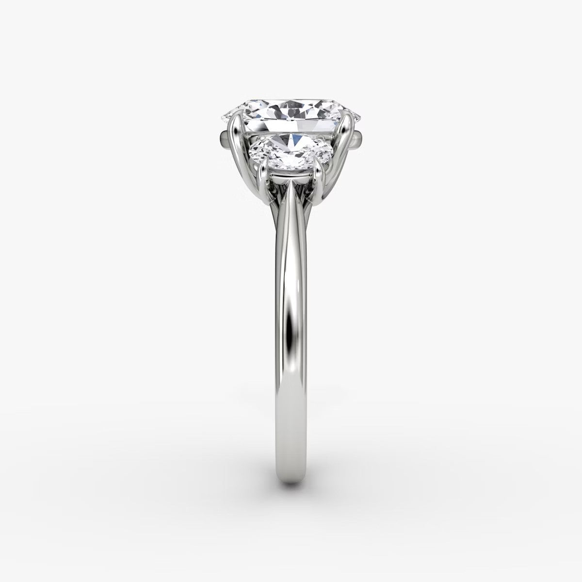 The Erelis Three Stone Oval Engagement Ring